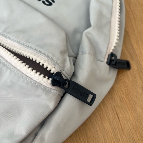 Light blue and navy champion backpack with little stain on the bottom - Picture 2 of 8